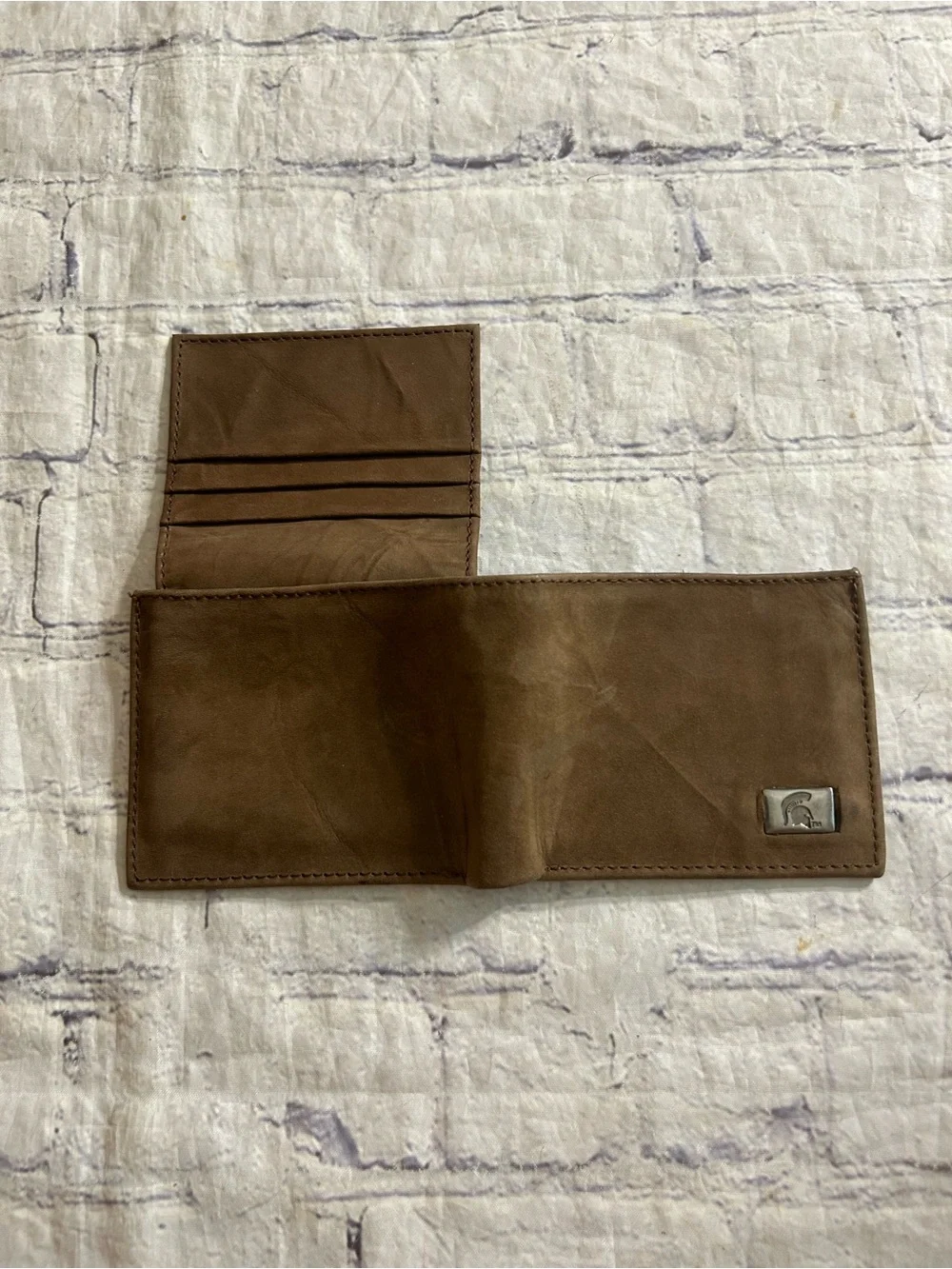 MICHIGAN STATE SPARTANS BROWN DISTRESSED BIFOLD WALLET METAL LOGO PLATE